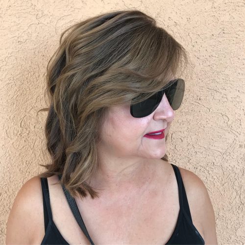 Adding bangs to a hairstyle is similar adding a cherry to the laissez passer on of an H2O ice cream sunday  53 Medium Hairstyles With Bangs: Our Latest Faves!