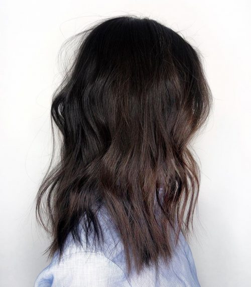 A nighttime brownish balayage is a pilus color characterized past times softer xiii Gorgeous Examples of Dark Brown Balayage Hair Colors