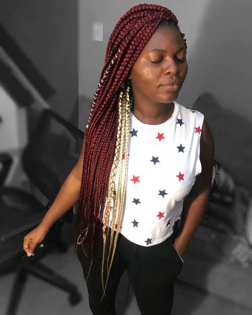 Burgundy box braids are a protective hairstyle dyed inwards a darker shade of ruddy in addition to divided i The xiii Hottest Burgundy Box Braids