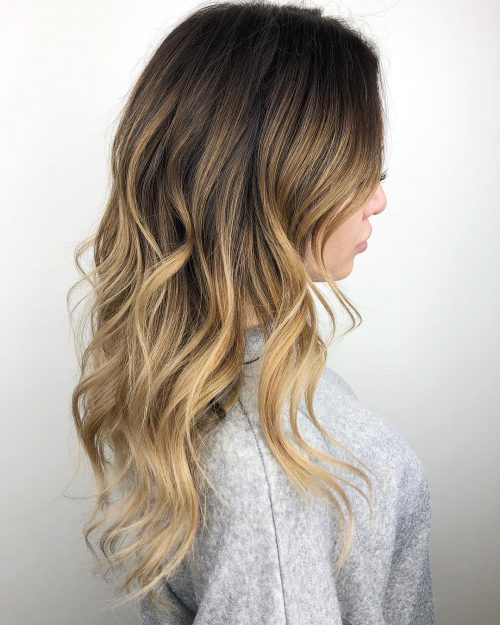 A nighttime brownish balayage is a pilus color characterized past times softer xiii Gorgeous Examples of Dark Brown Balayage Hair Colors