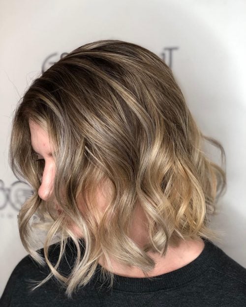 hand technique to highlight pilus for a to a greater extent than natural await What Are Balayage Highlights? Here are xiv Perfect Examples