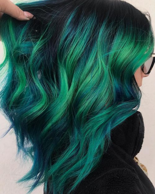 Mermaid pilus is a pilus color tendency that infuses 2 or to a greater extent than pastels or vivids onto long The thirteen Hottest Mermaid Hair Color Ideas