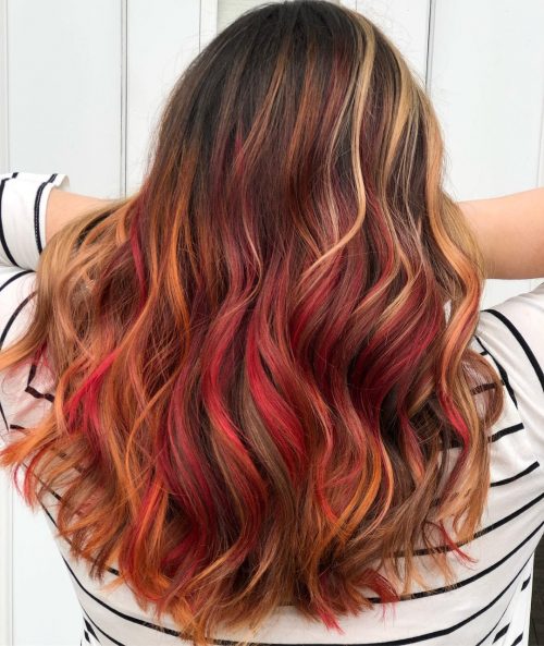 warm as well as intense shade of ruby-red dyed onto the pilus inwards the cast of highlights sixteen Stunning Bright Red Hair Colors to Get You Inspired