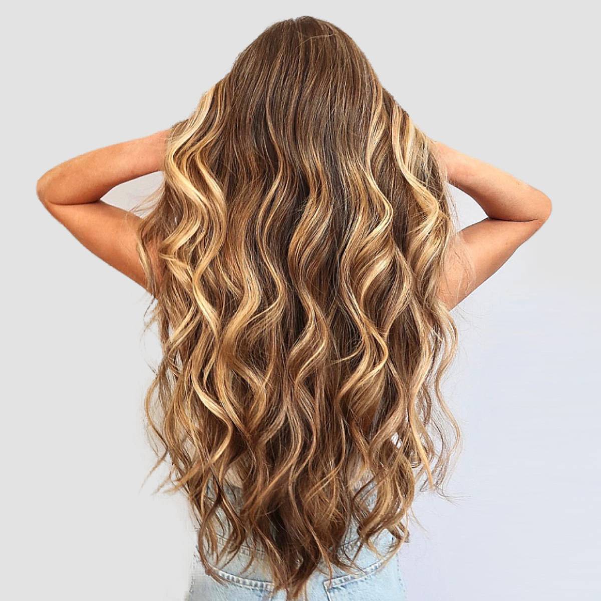 Hair Coloring Gradient From Light Golden To Brown On A Girl With Long Curly  Hair In The Back Stock Photo Picture And Royalty Free Image Image  147112709