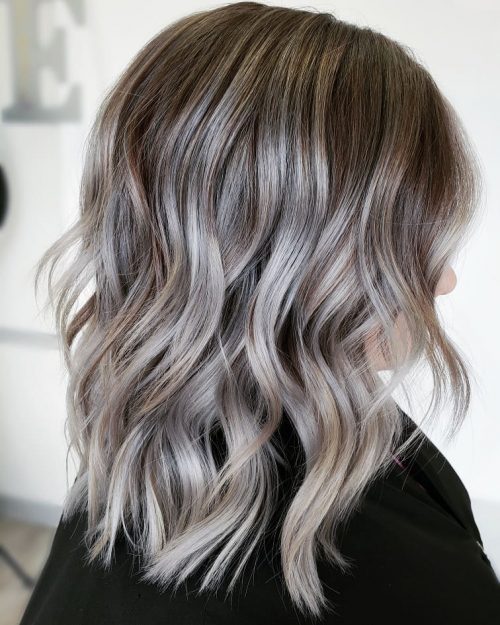 A nighttime brownish balayage is a pilus color characterized past times softer xiii Gorgeous Examples of Dark Brown Balayage Hair Colors