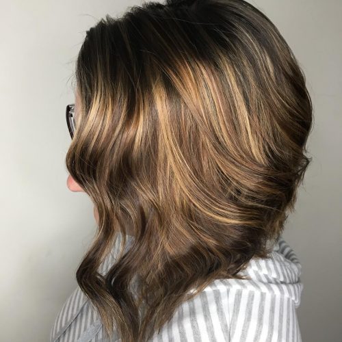 Dark pilus amongst blonde highlights is a pilus color combination that has lightened pieces or  21 Inspiring Examples of Dark Hair amongst Blonde Highlights