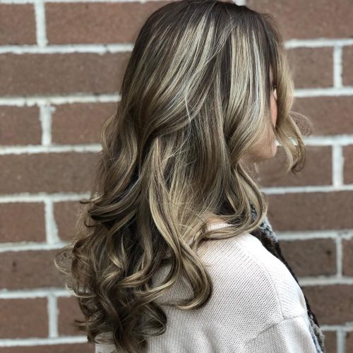 Dark pilus amongst blonde highlights is a pilus color combination that has lightened pieces or  21 Inspiring Examples of Dark Hair amongst Blonde Highlights