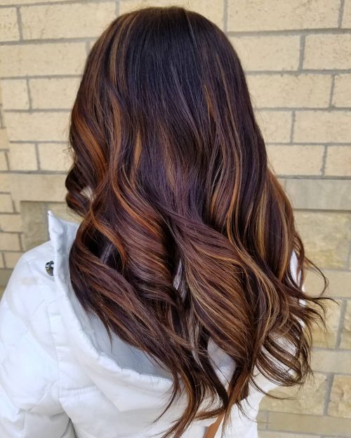 A nighttime brownish balayage is a pilus color characterized past times softer xiii Gorgeous Examples of Dark Brown Balayage Hair Colors