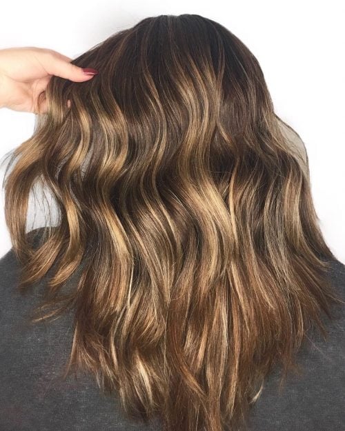 Dark pilus amongst blonde highlights is a pilus color combination that has lightened pieces or  21 Inspiring Examples of Dark Hair amongst Blonde Highlights