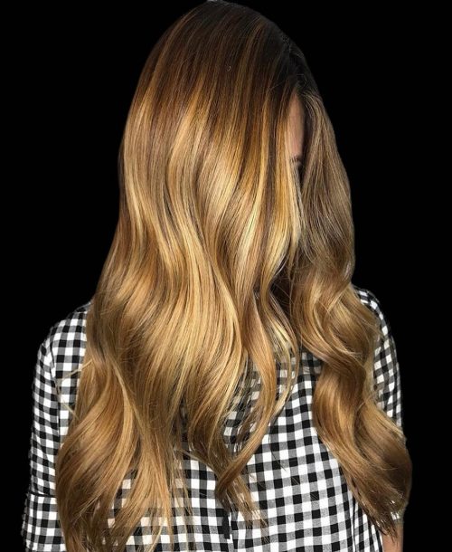 A hair color that's a glossy gold brown