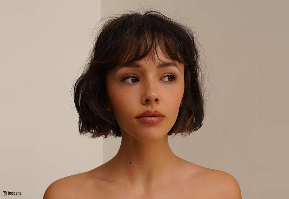 Image of Short bob with blunt bangs haircut for oval face