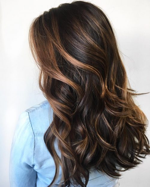 A nighttime brownish balayage is a pilus color characterized past times softer xiii Gorgeous Examples of Dark Brown Balayage Hair Colors