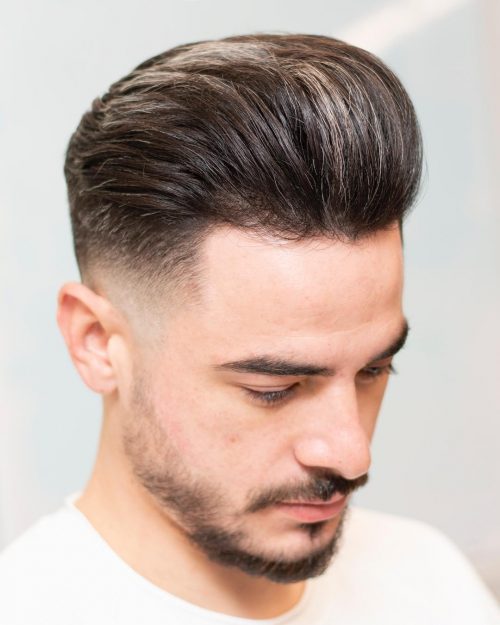 s haircut that combines the classic pompadour hairstyle amongst a razor cutting fade The fifteen Best Examples of Pompadour Fade Haircuts