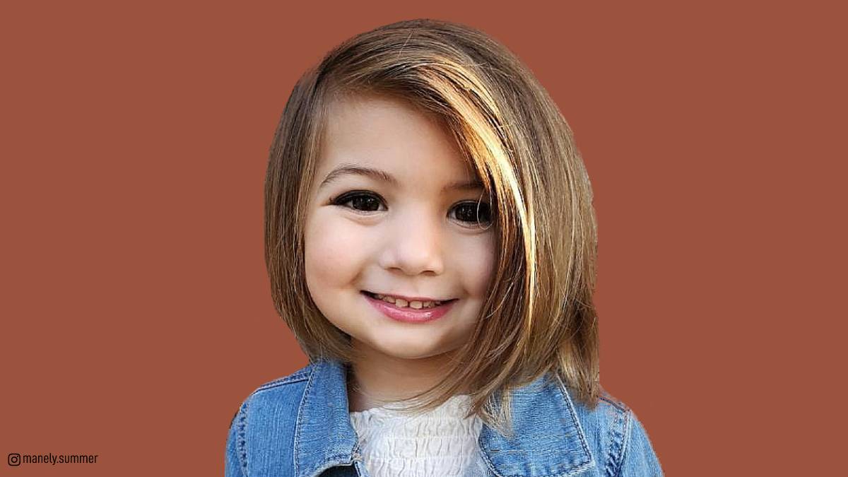 Premium Photo  Cute little girl getting hair cut