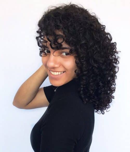 Curly bangs is a hairstyle where the bangs are curled from the pilus These are The fifteen Cutest Curly Bangs You Should Consider Trying