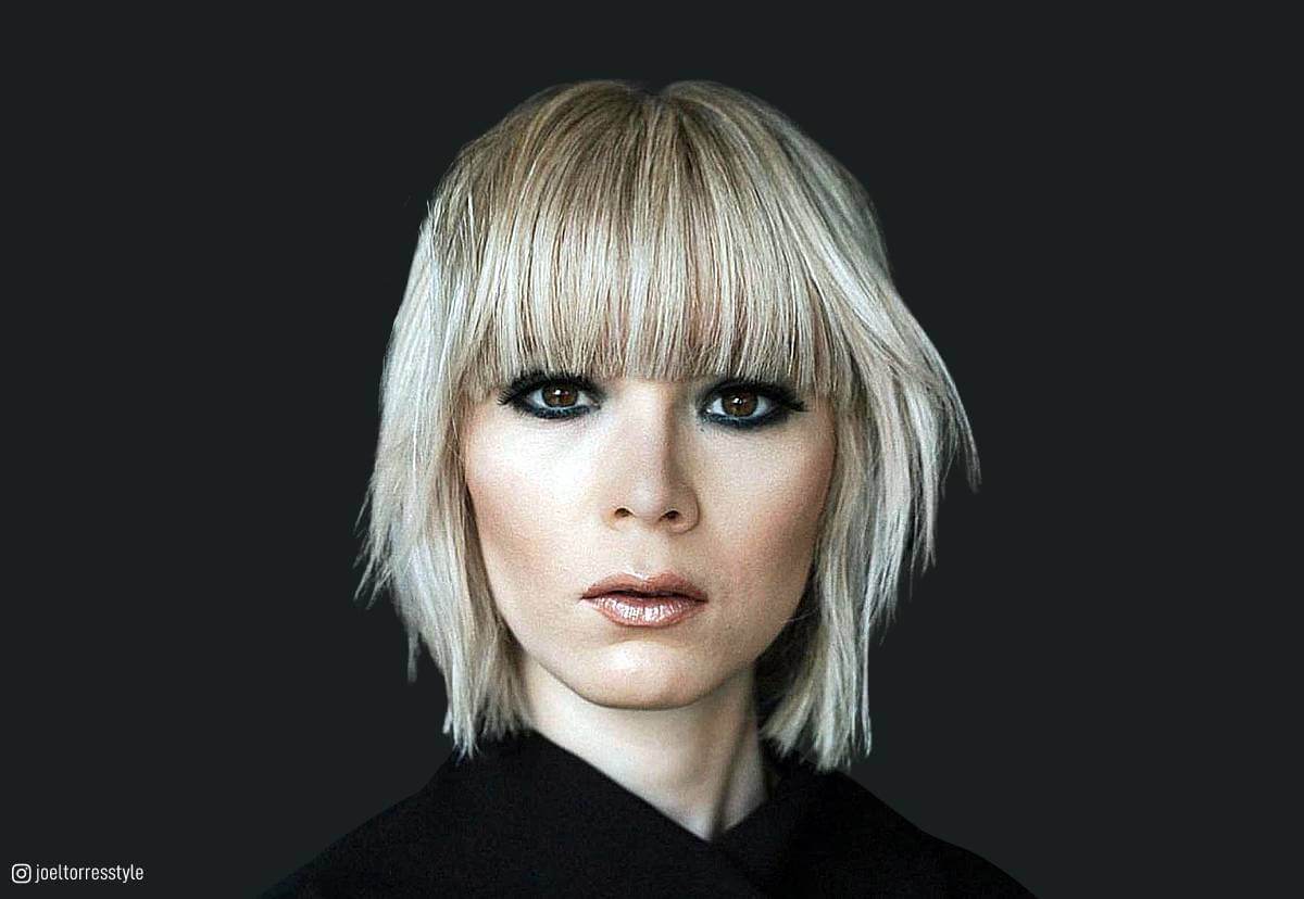 Image of Blunt bob with angled bangs fine hair