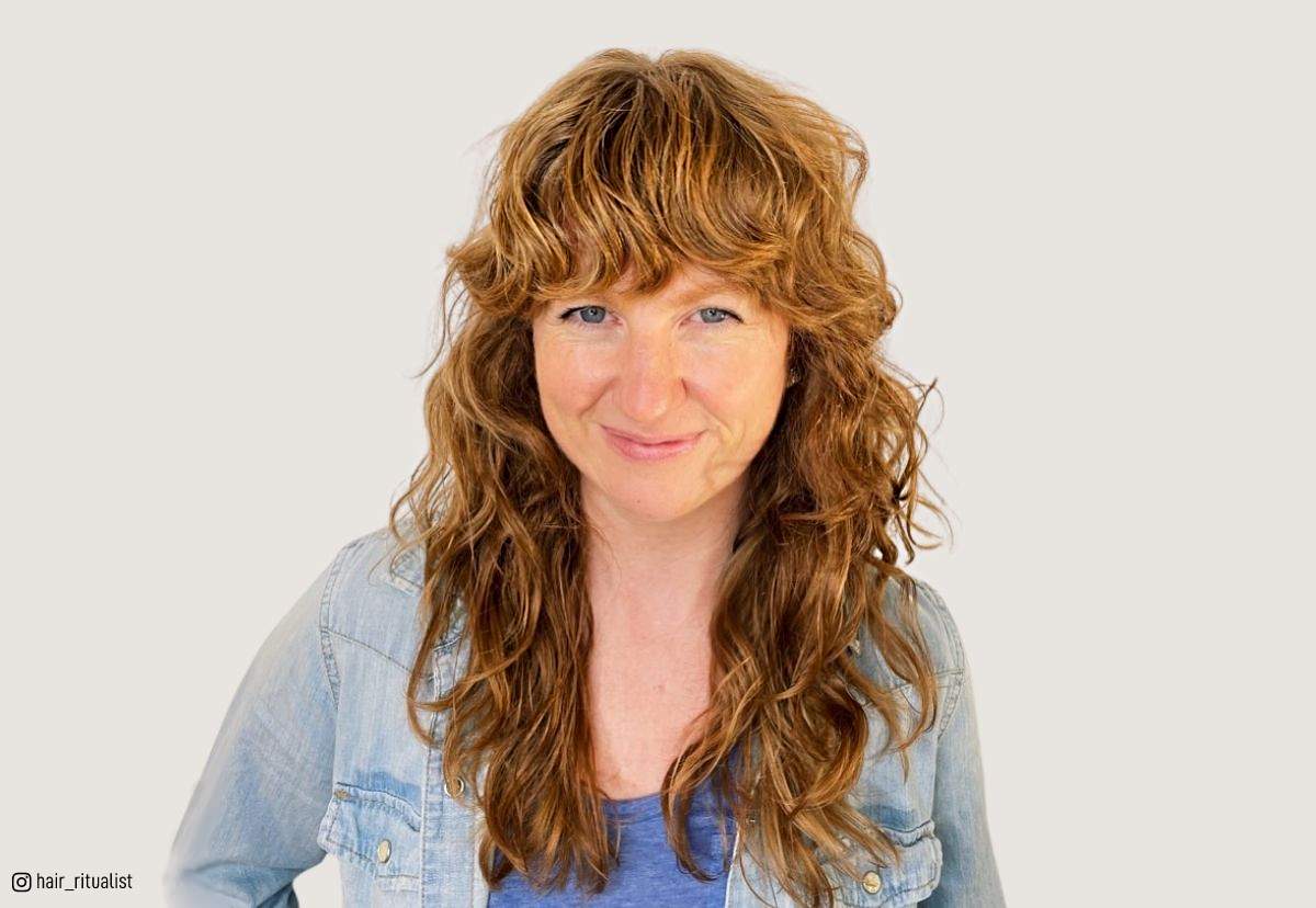 Image of Shaggy curly hair with beach waves