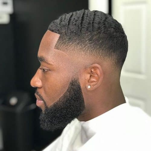 A depression bald fade is a type of fade that starts at the peel degree in addition to increases inwards length sh fifteen Awesome Low Bald Fade Haircuts for Men